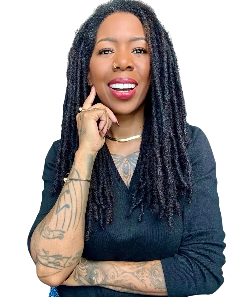 Portrait of Noelle Ranzy smiling in a close-up headshot